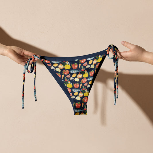 Classic bikini bottom with quirky and colorful foodie patter featuring veggies, olive oil and fish