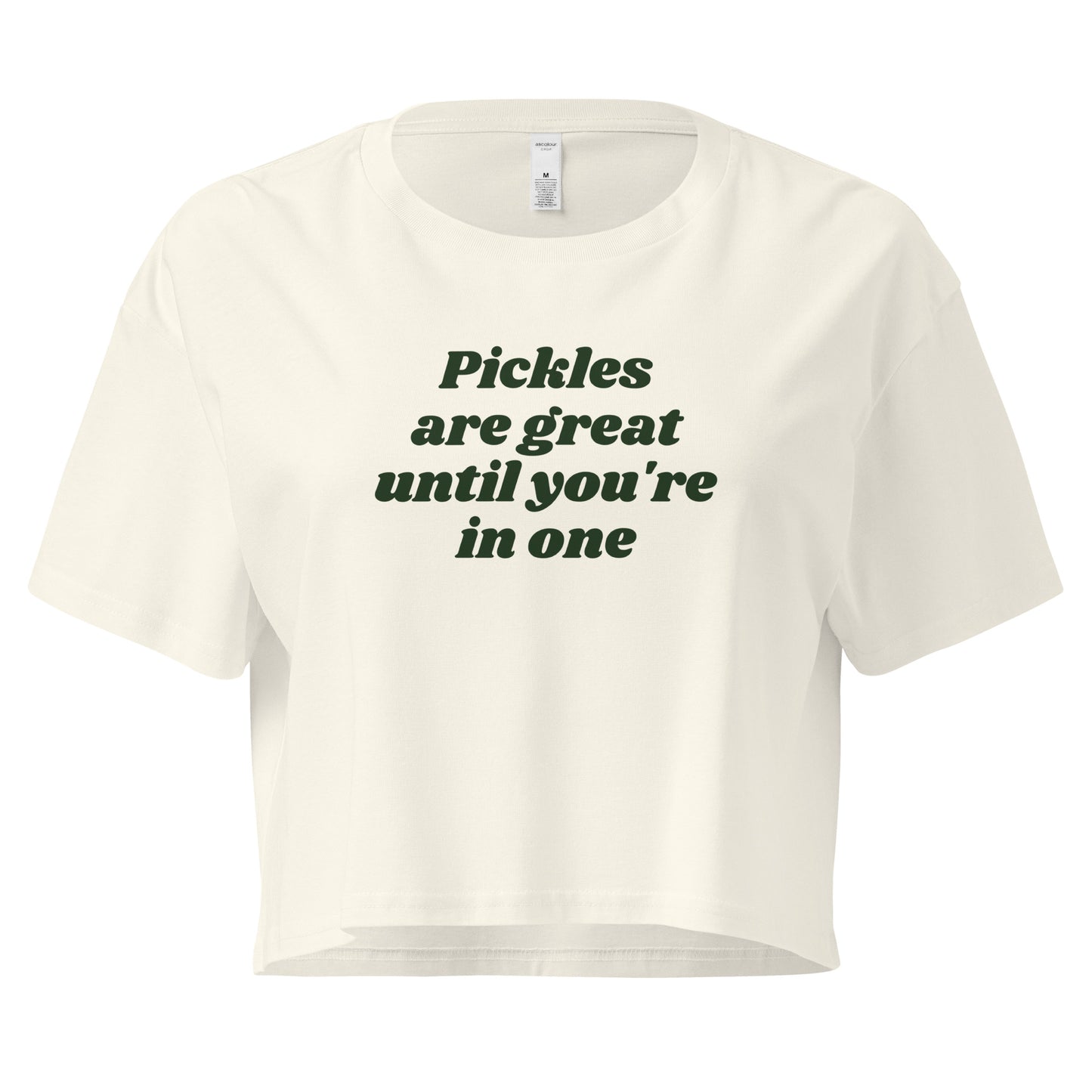 Natural color crop top with the text 'Pickles are great until you're in one' printed in green.