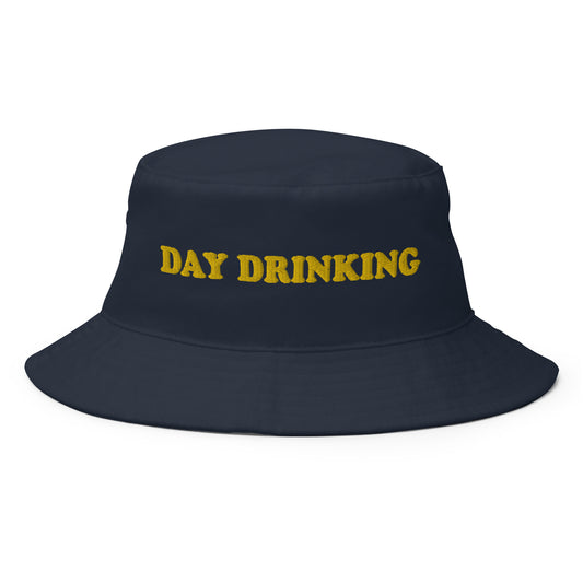 Navy Day Drinking Hat - Looking for a funny bucket hat? A day drinking hat for summer? This Day Drinking Bucket Hat is just what you need! It's comfortable and comes in a variety of colors with a "day drinking", expertly embroidered across the front. The perfect bucket hat for day parties and everyday streetwear.