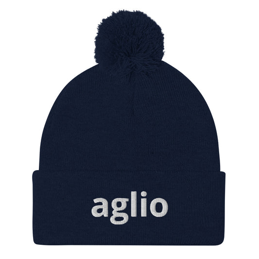 Navy aglio beanie from Nina's Funky Shop by ninanush - An Italian garlic beanie for aglio lovers. This aglio hat is a classic pom pom beanie with a funny Italian word embroidery. The perfect cozy hat for Italians, garlic enthusiasts and foodies of all kinds. Stand out and share your love of garlic in this Italian garlic hat or give it as a cute gift for an Italian foodie.