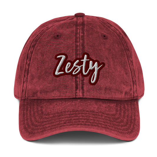 Maroon zesty hat - The Zesty Dad Hat, a perfect accessory to add a touch of personality to your outfit. With a vintage-style faded look, a red and white unique embroidery, and an adjustable strap, this quirky dad hat was made just for you. Wear this colorful dad hat as everyday wear or give this hat as a funny gift to a zesty friend.