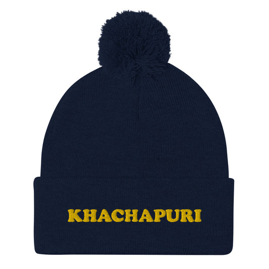 Navy blue beanie with khachapuri embroidery - We love khachapuri! This khachapuri hat is a comfortable and unusual foodie beanie with a classic pom pom on top and a funky yellow embroidery. The beanie is cozy and just what every foodie and khachapuri lover needs. Celebrate your love for khachapuri and Georgean food in this this funky food beanie hat.