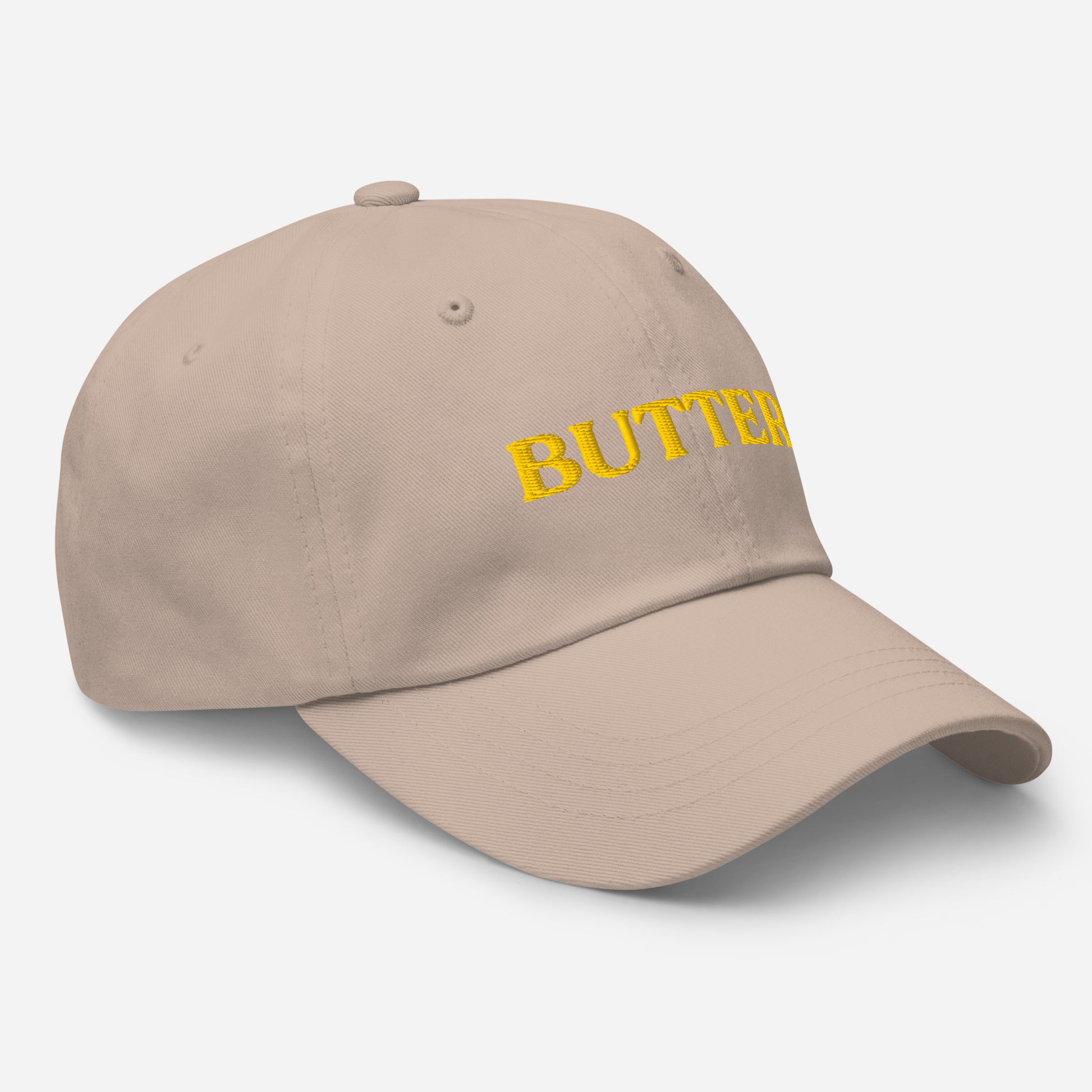 Side of beige butter embroidered hat