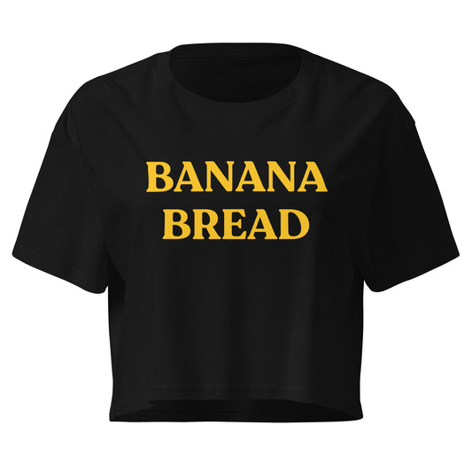 Black crop t-shirt with banana bread printed on the front in yellow.