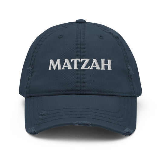 Navy Matzo Hat - It's matzah season! Looking for a funny Passover gift? This Matzah Hat is made of comfortable cotton with an adjustable closure and a funny design, expertly embroidered on the front. The perfect Passover hat for matzah lovers and foodies of all kinds. Designed by Nina and made just for you! 