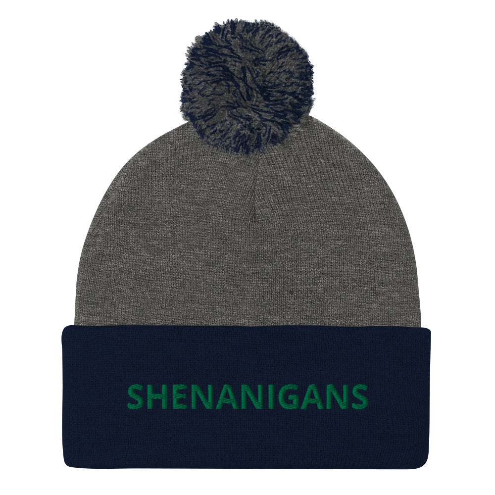 Navy and Gray Shenanigans Beanie - A warm and cozy pom pom beanie with "shenanigans", expertly embroidered accross the front. Looking for something personalized? A different embroidery color? Shoot us an email or check out our customizable apparel!