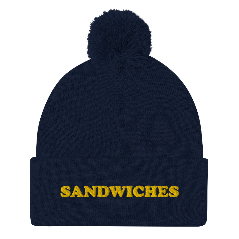 Navy Foodie Hat - Love sandwiches? This sandwich hat is just for you! It's a warm and cozy beanie with a classic pom pom on top and "sandwich", expertly embroidered on the front. Designed by Nina and made just for you! Looking for something personalized? A different embroidery color? Shoot us an email or check out our customizable apparel! 