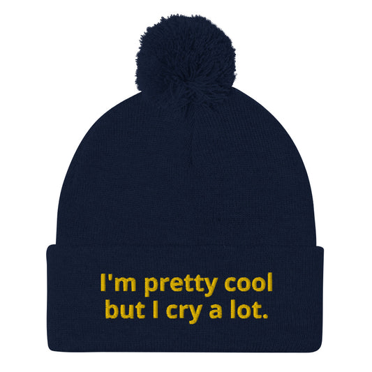 Weird Navy Beanie - Looking for a funny gift? A unique hat with a message? This beanie is warm and cozy with a classic pom pom on top and "I'm pretty cool but I cry a lot.", expertly embroidered on the front. Looking for something personalized? Shoot us an email!
