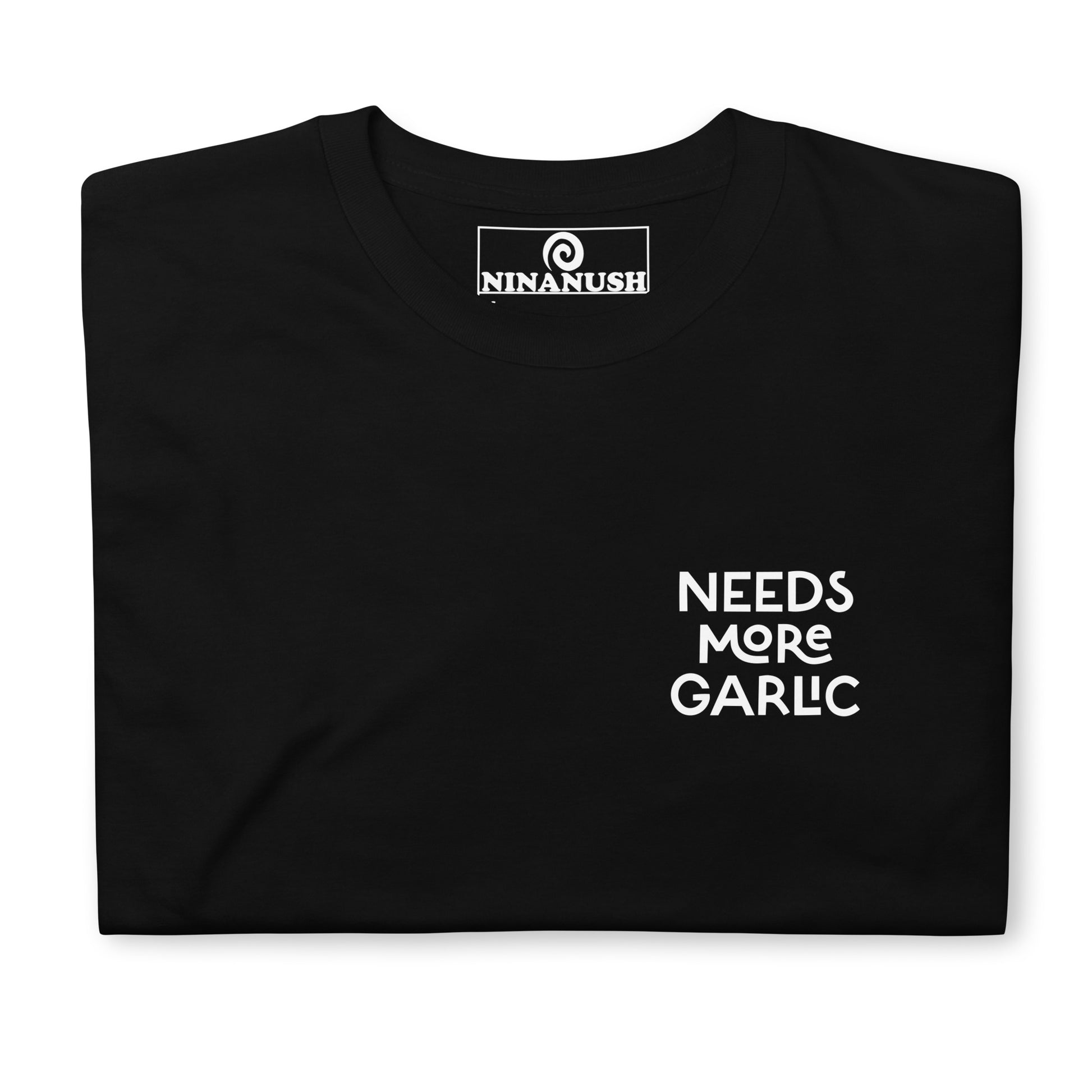 Black needs more garlic t-shirt from Nina's Funky Shop by ninanush - This funky foodie t-shirt is for garlic lovers and foodies of all kinds. It's a cotton shirt with "Needs more garlic" printed on the front. Add a little personality to your style in this garlic enthusiast t-shirt or give it as a funny gift for a quirky tee enthusiast. It's a unique foodie tee made just for you.