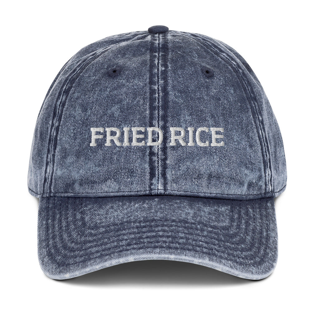 Navy  fried rice hat from Nina's Funky Shop by ninanush - Calling all fried rice enthusiasts! This funny fried rice dad hat is comfortable with a vintage-style washed out material and the words "Fried Rice", expertly embroidered on the front. Make a statement and share your foodie passions in this weird hat. The perfect dad hat for foodies or gift for fried rice lovers of all kinds.