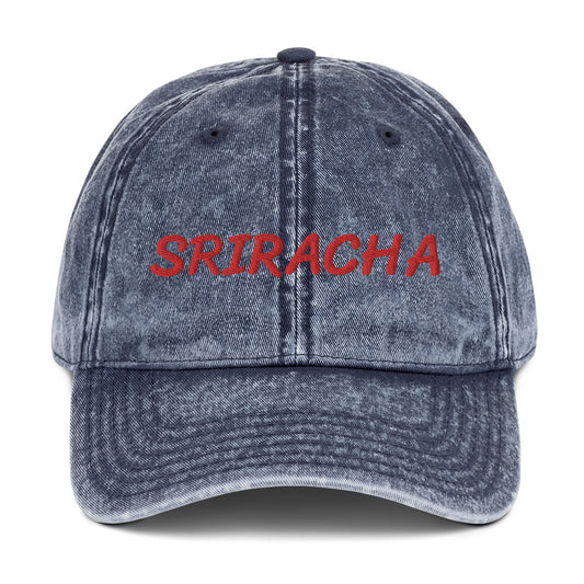 Blue sriracha dad hat from Nina's Funky Shop by ninanush - The Sriracha dad hat! Show your love for the beloved hot chili sauce in this funny foodie dad hat. It's comfortable with the word "Sriracha", embroidered on the front. It's a unique accessory that brings personality to your everyday outfits. Stay funky and eat your favorite hot sauce in this sriracha enthusiast hat.