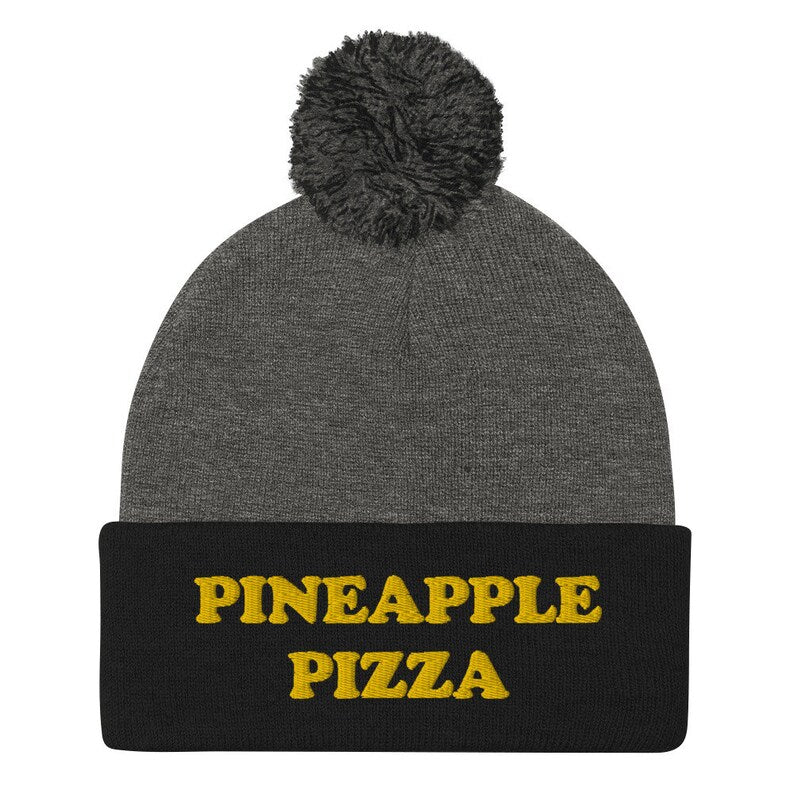 Black and gray pineapple pizza hat - Are you in the pineapple pizza club? Eat pineapple pizza in style in a funny foodie beanie for pizza lovers. It's a unisex embroidered beanie for pineapple pizza enthusiasts. If you love pineapple pizza, this weird foodie hat is a must have or give this warm and cozy hat as a funny gift for pineapple pizza people. 
